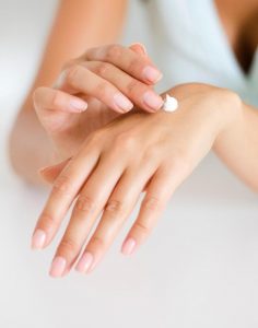 Female Hands With Moisturizer Lotion