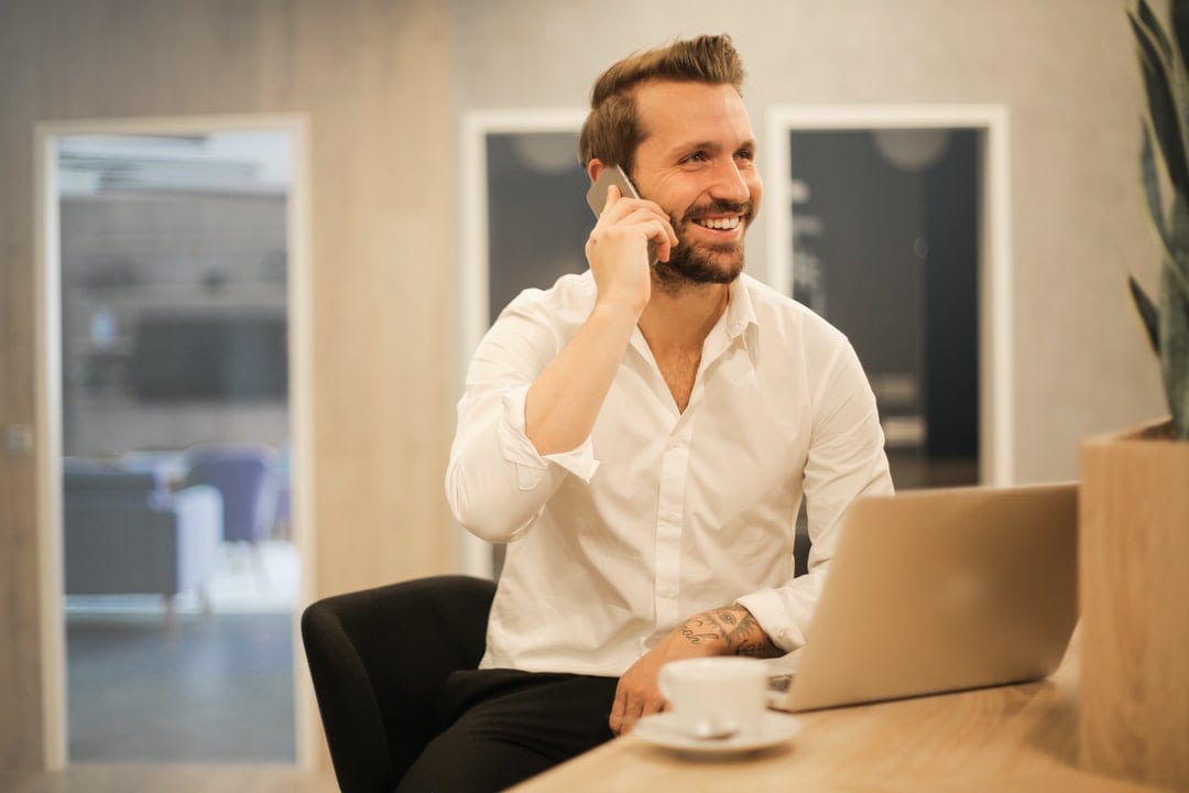 Happy Caucasian Man Talking On Mobile Phone